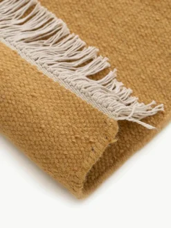 Handgeweven wollen vloerkleed Liv met franjes^Benuta Fashion