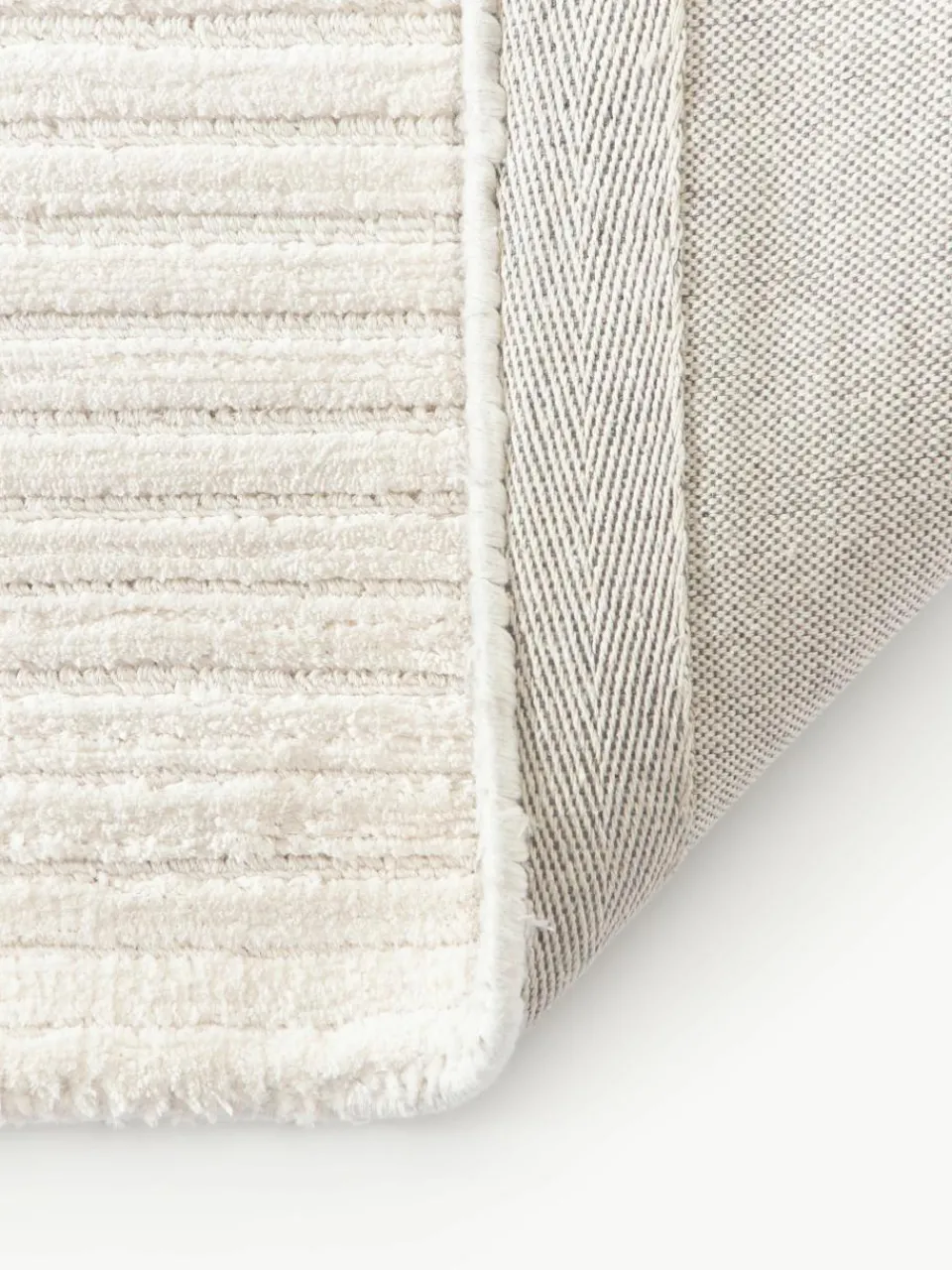 Pluizig hoogpolig vloerkleed Wes met hoog-laag structuur, handgeweven^Westwing Collection Outlet