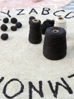 Rond kindervloerkleed ABC met lettermotief^Lorena Canals Fashion